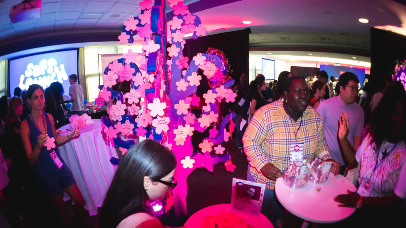 Students at a brand activation table